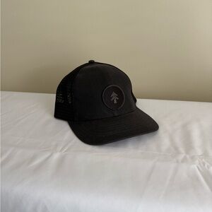 Black Trucker Hat with Logo Patch